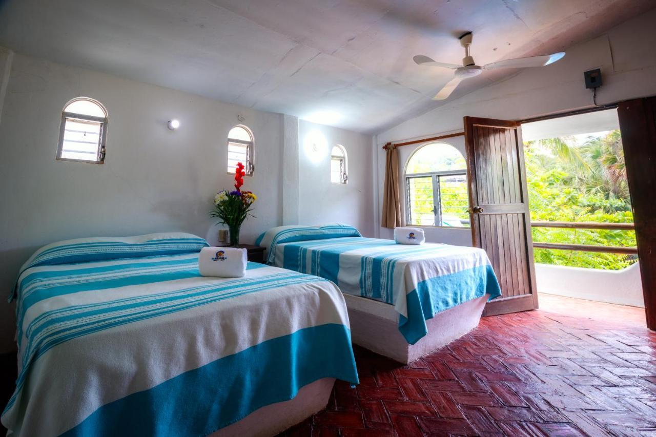 Hotel Bungalows Acuario Пуэрто-Эскондидо Экстерьер фото