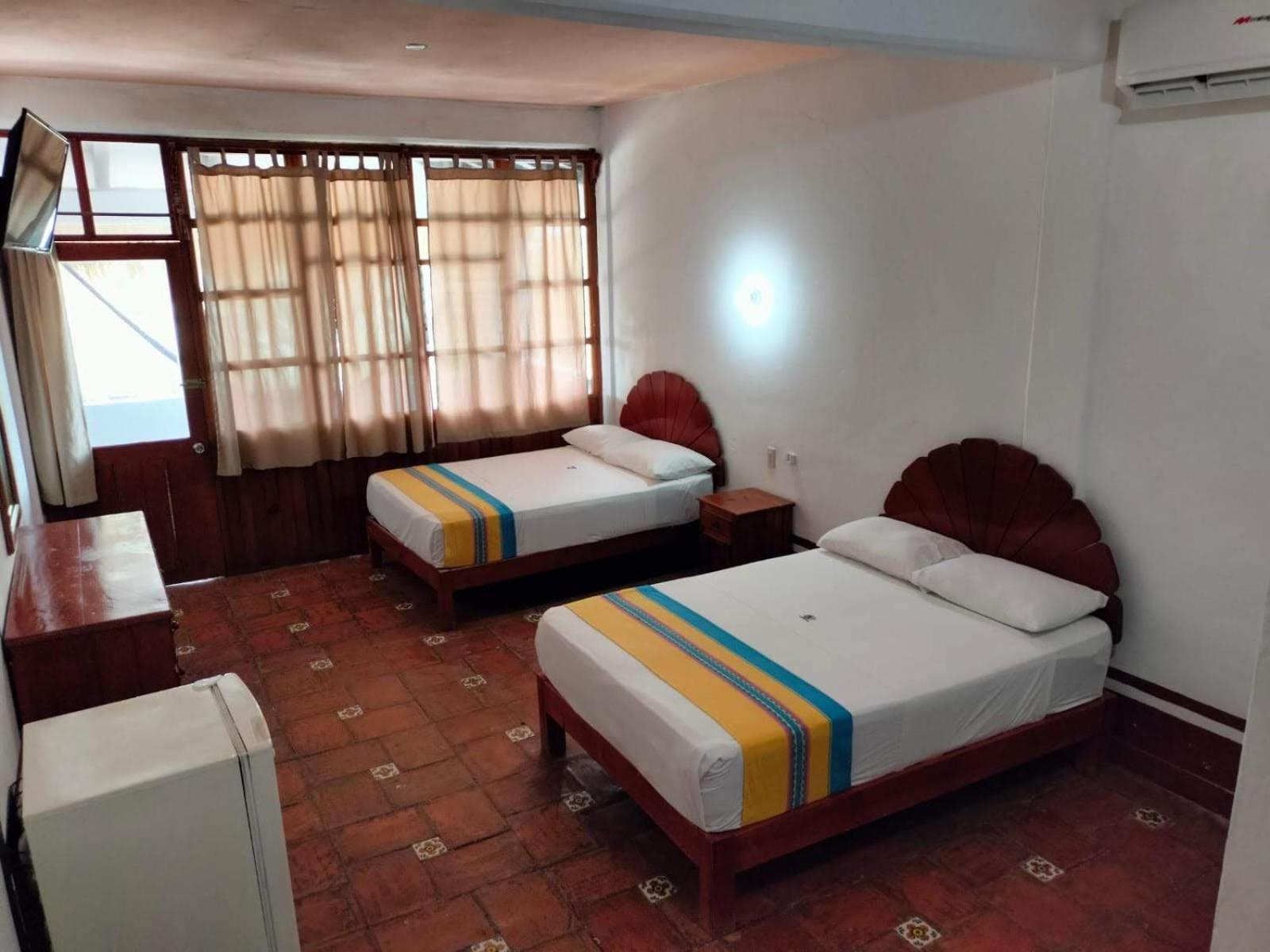 Hotel Bungalows Acuario Пуэрто-Эскондидо Экстерьер фото